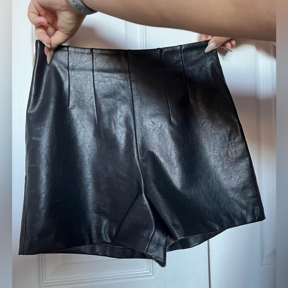 Express black leather shorts